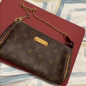 Authentic Louis Vuitton Eva. Damage side